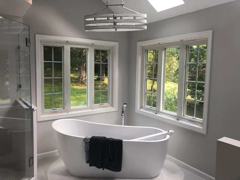 Beautiful Pella casements above a freestanding tub